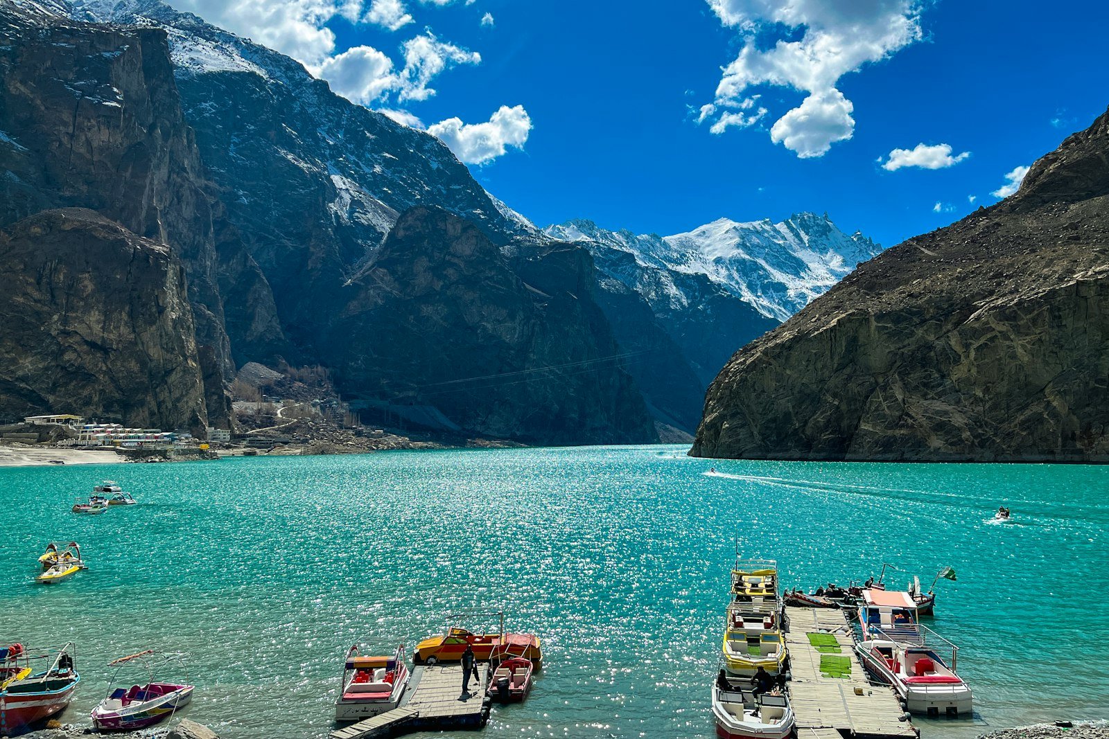 The turquoise water of Attabad Lake between steep mountains in Upper Hunza