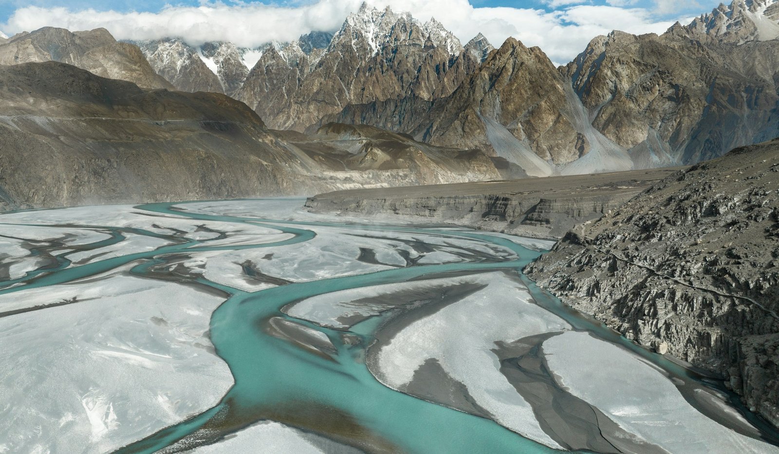 Sharp snow-dusted peaks above the Hunza river near Passu